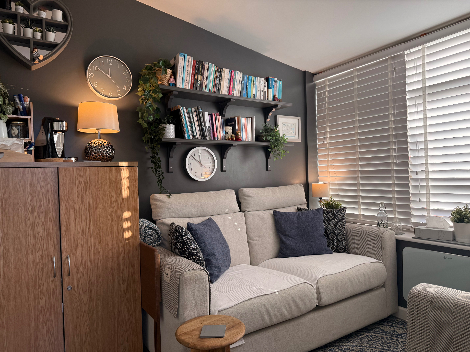 Kate Ramsay's therapy room - comfortable seating area with cozy cushions and natural light